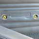 Text found under the armrest/door handle that screws to Brian’s brother’s 1993 Jeep Cherokee’s passenger-side door panel.